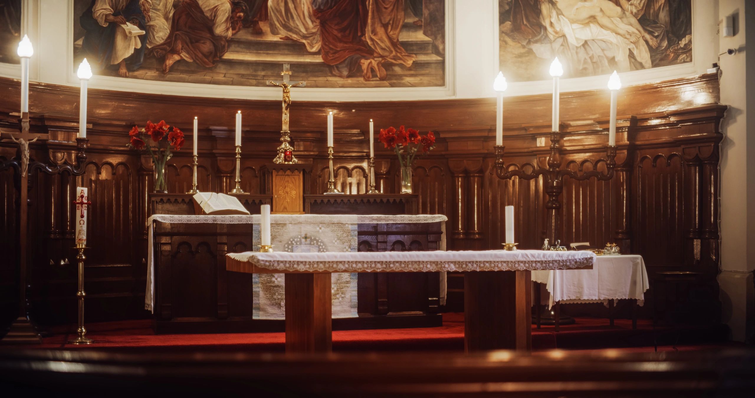 Church altar with candles and flowers