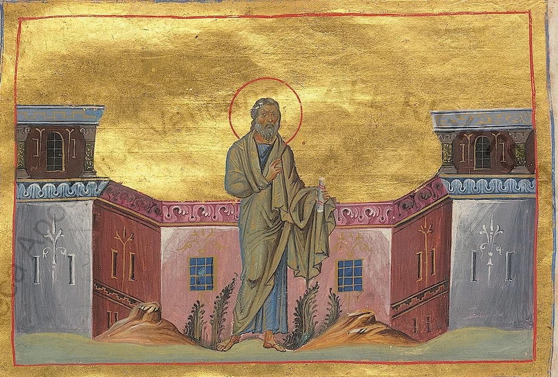 Byzantine miniature: the Prophet Joel standing before buildings with one hand raised.