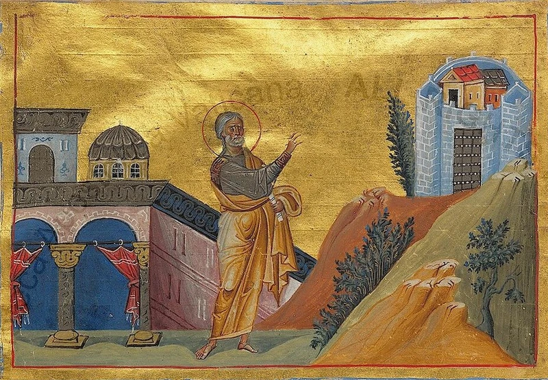 Byzantine miniature: the Prophet Nahum standing between a city wall and a rocky hill.