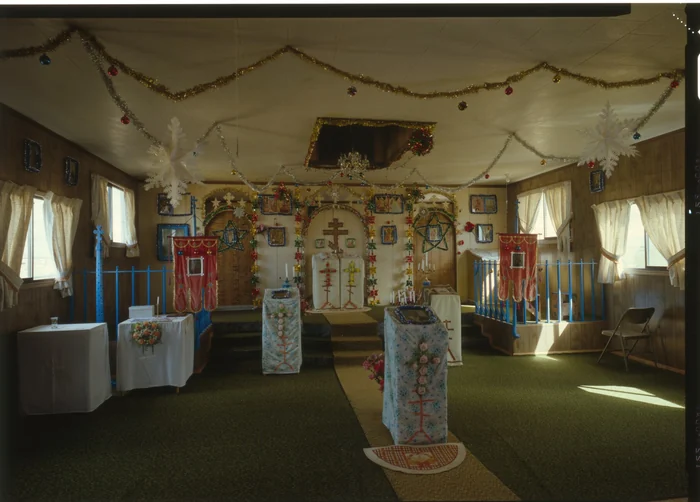 The nave of St. Nicholas Church, Igiugig, Alaska, looking east to the iconostasis, photographed for the Historic American Buildings Survey